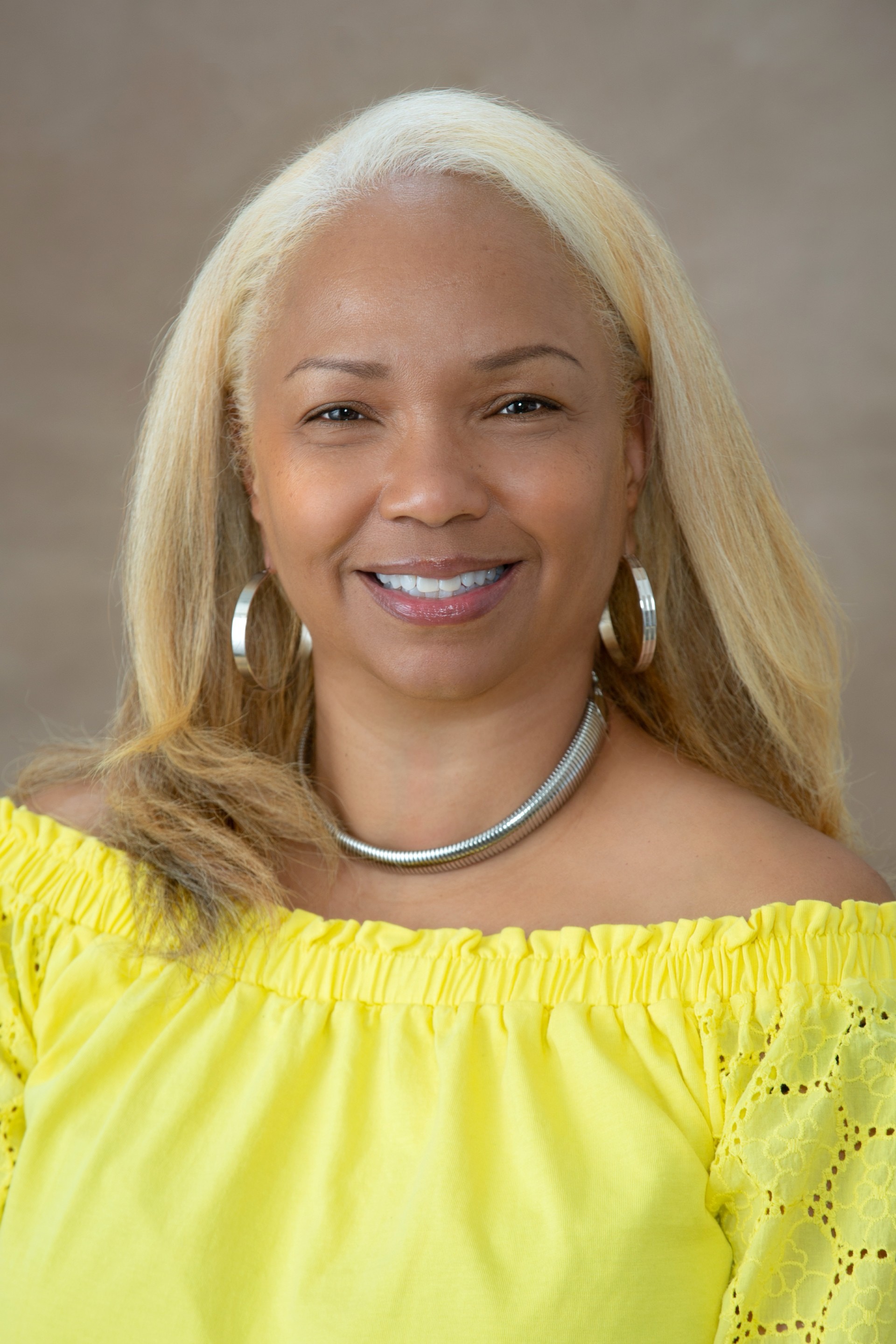Ceola J. Griffin in yellow blouse